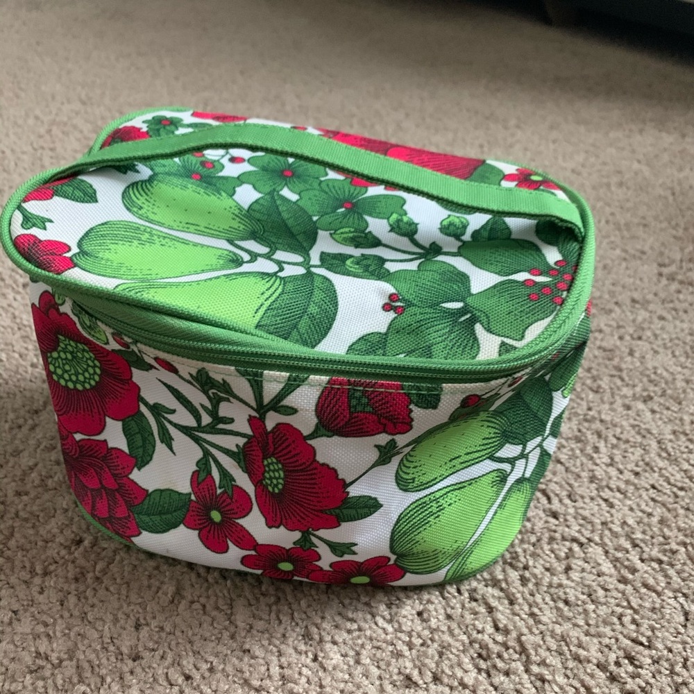 Clinique brand floral makeup bag.